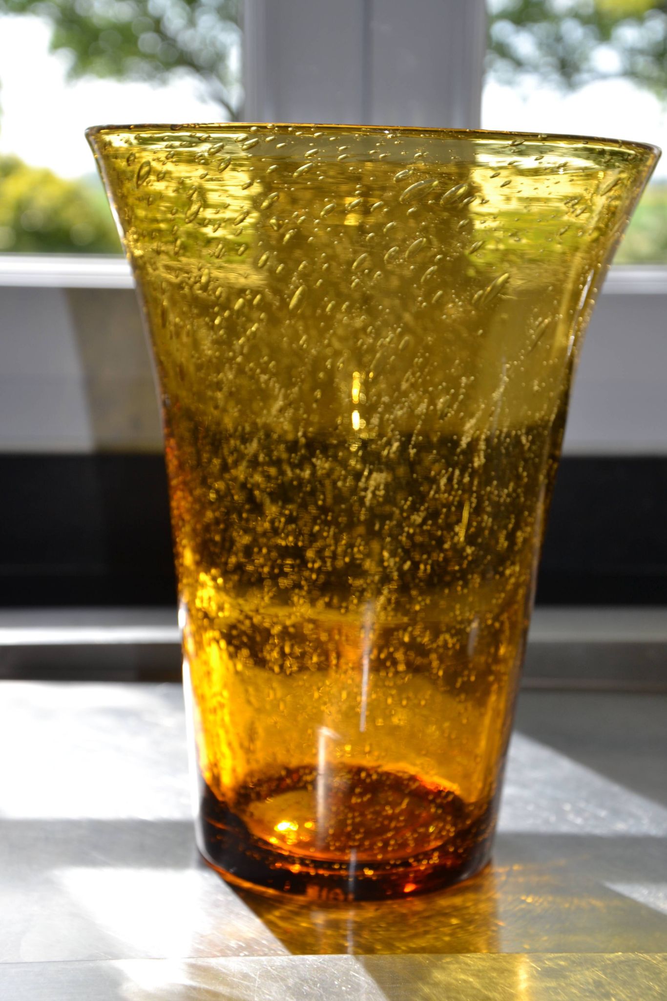 Large vase signed Biot in amber colour.