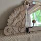 Art Deco wall coat rack with 3 hooks and a mirror.