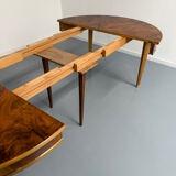 Round walnut Napoleon III extendable table with bronze top in good condition.