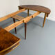 Round walnut Napoleon III extendable table with bronze top in good condition.