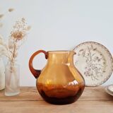 Antique amber glass pitcher