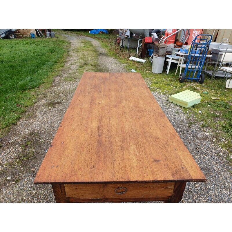 19th century country farmhouse table in walnut and pine, with 3 drawers