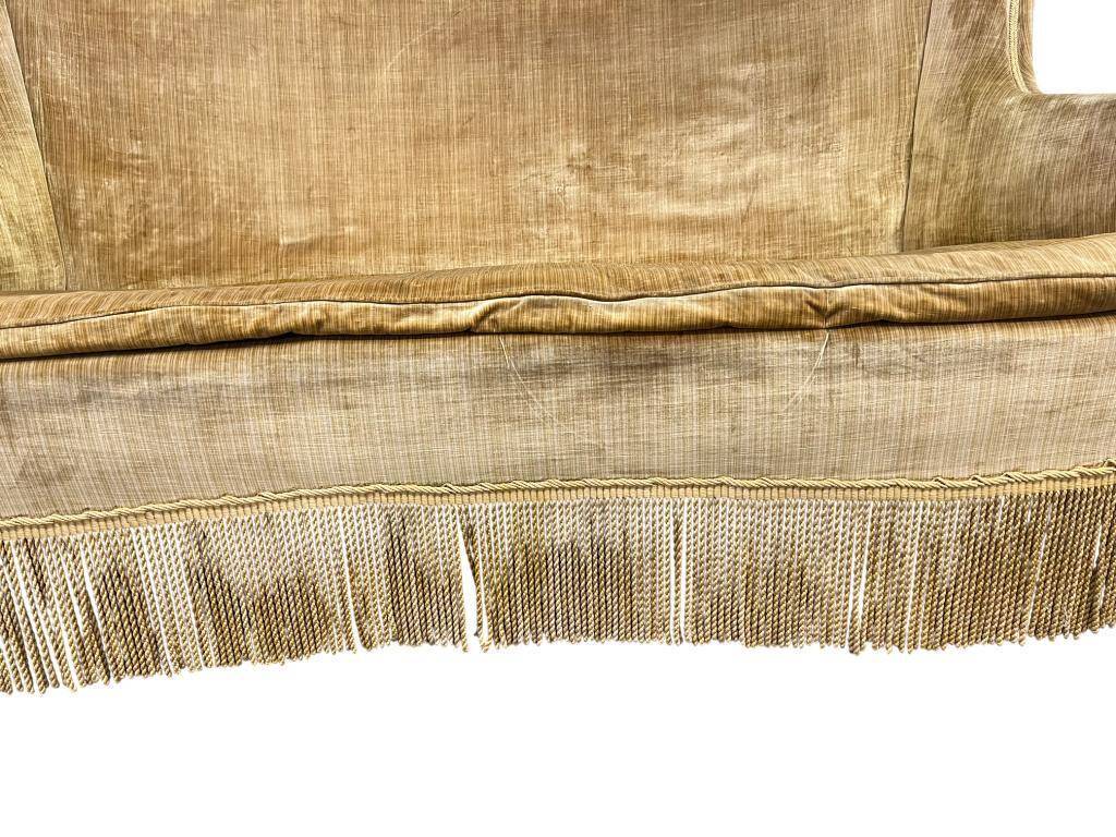 Vintage mustard yellow two-seater sofa with fringe