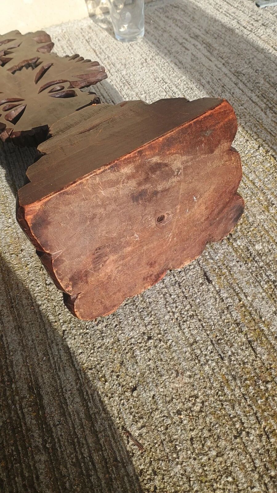 Antique wooden crucifix carved from the Black Forest with grapes and leaves.