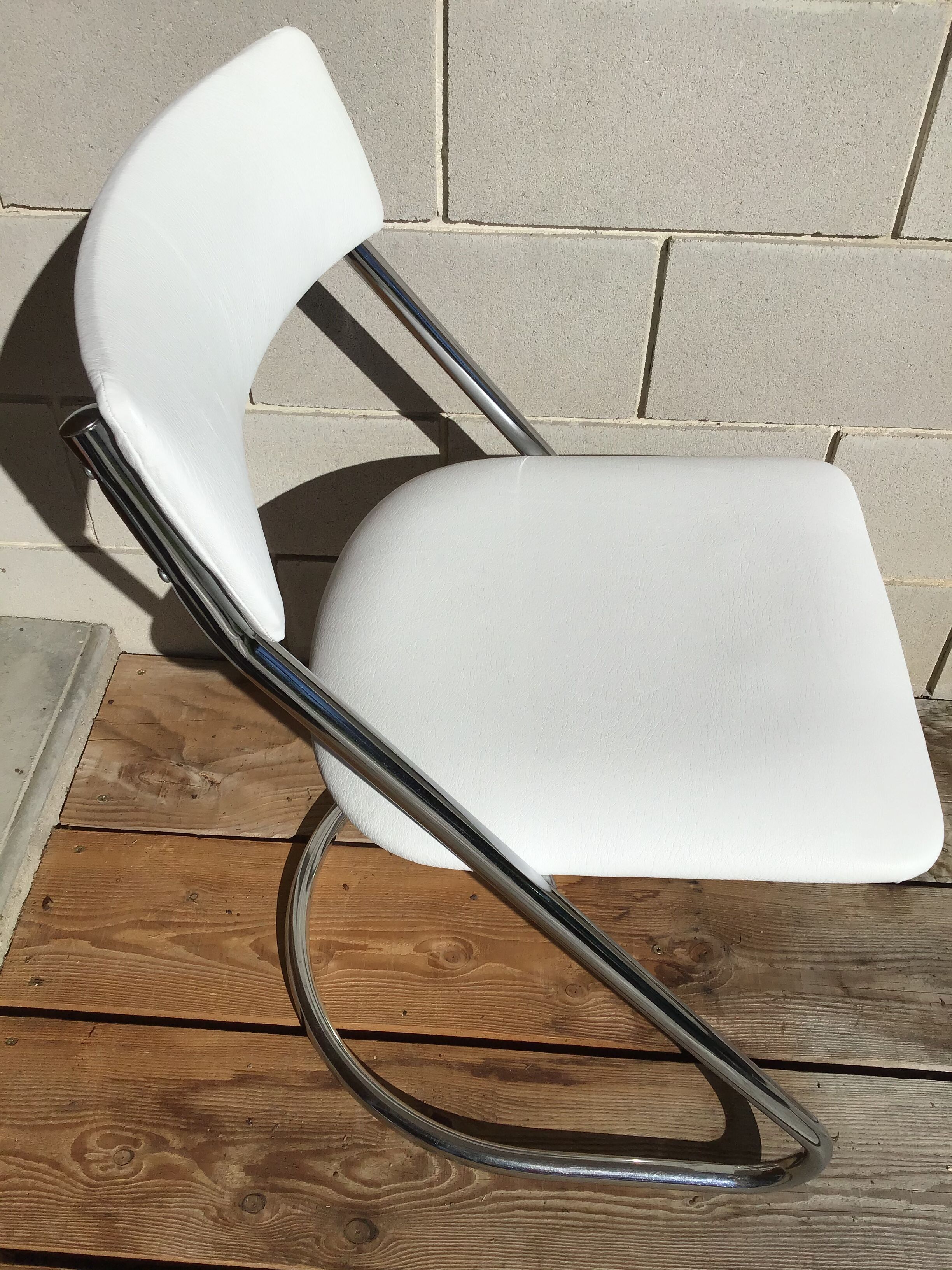 White faux leather sled chair