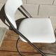 White faux leather sled chair