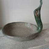 Empty pocket cup forming a bird