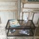 Metal coffee table with smoked glass.