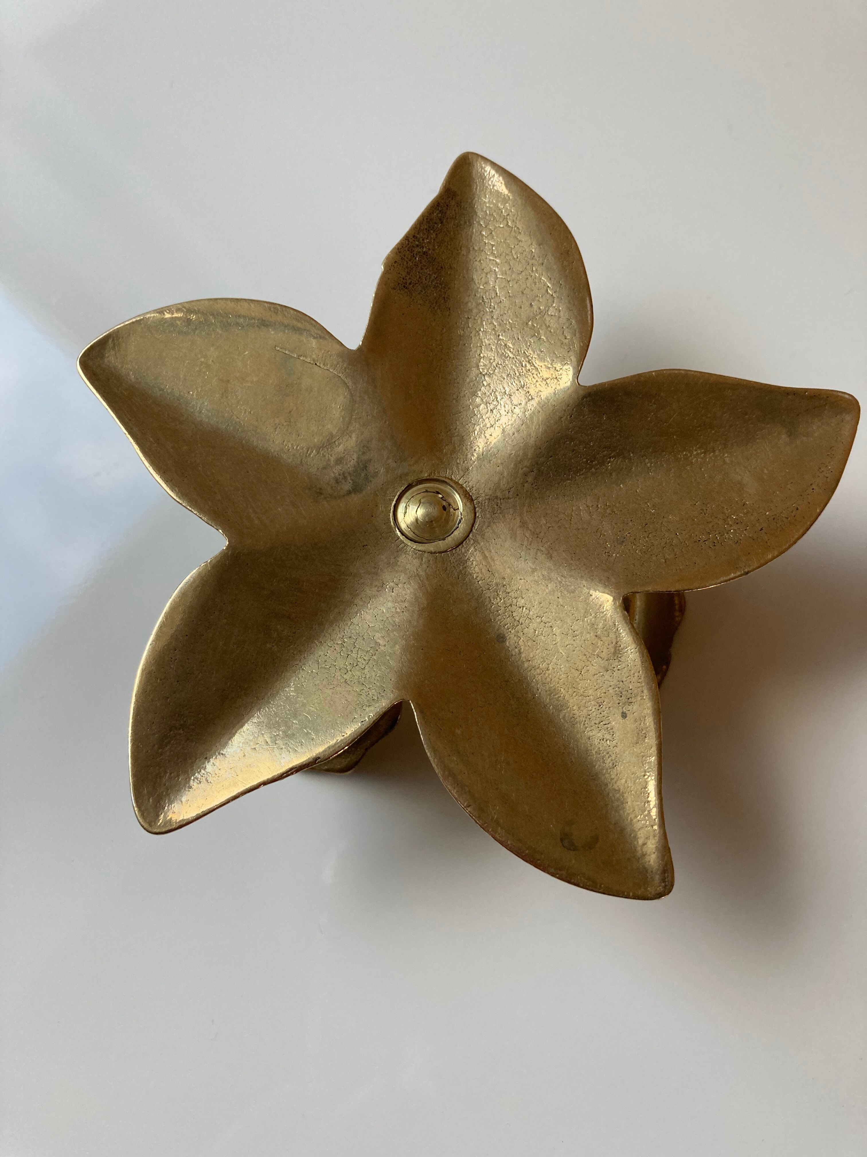 Brass flower candle holder