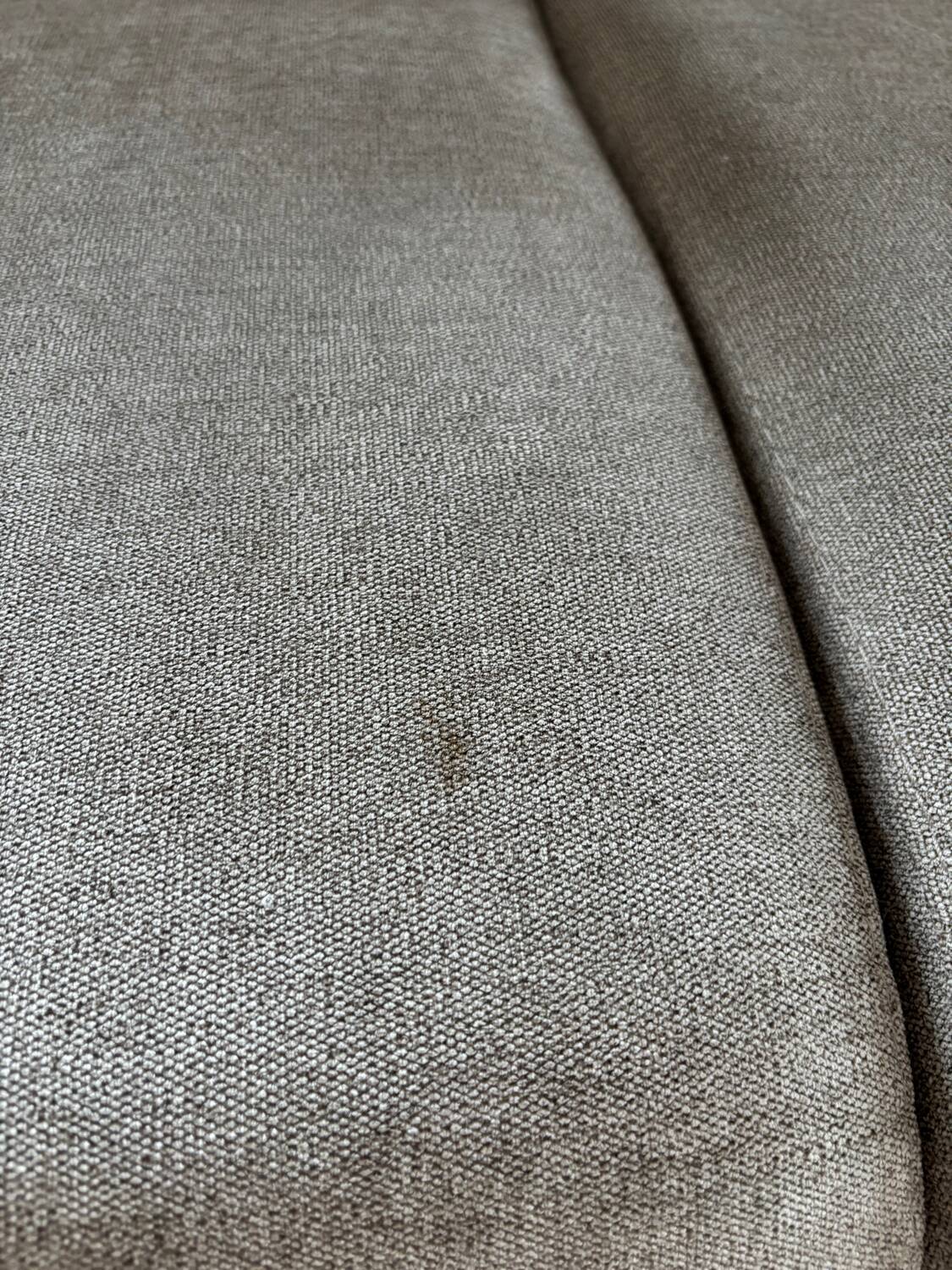 Grey two-seater sofa