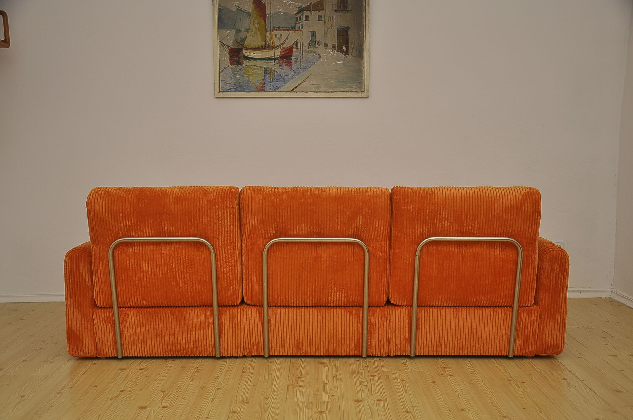 Orange corduroy modular sofa, 1970s.