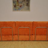 Orange corduroy modular sofa, 1970s.