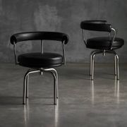 LC7 chairs by Charlotte Perriand, Le Corbusier and Pierre Jeanneret, 1980s
