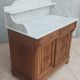 Antique walnut and white marble bathroom cabinet