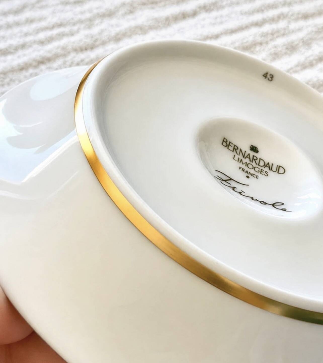 Bernardaud coffee/tea cup with saucer from the Frivole collection.
