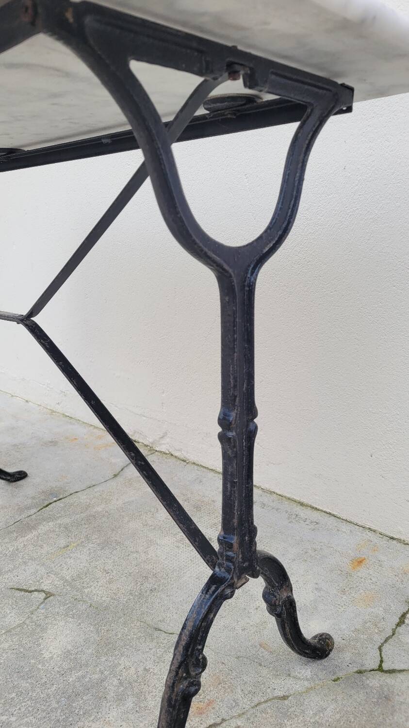 Marble and antique cast iron bistro table
