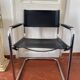 Vintage design armchair in leather and metal