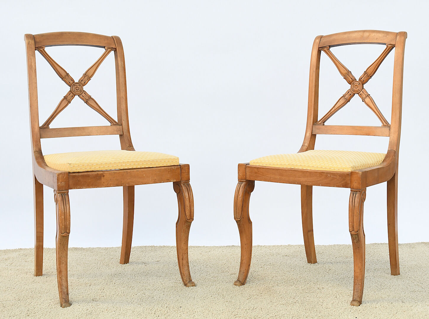 Pair of back chairs with braces