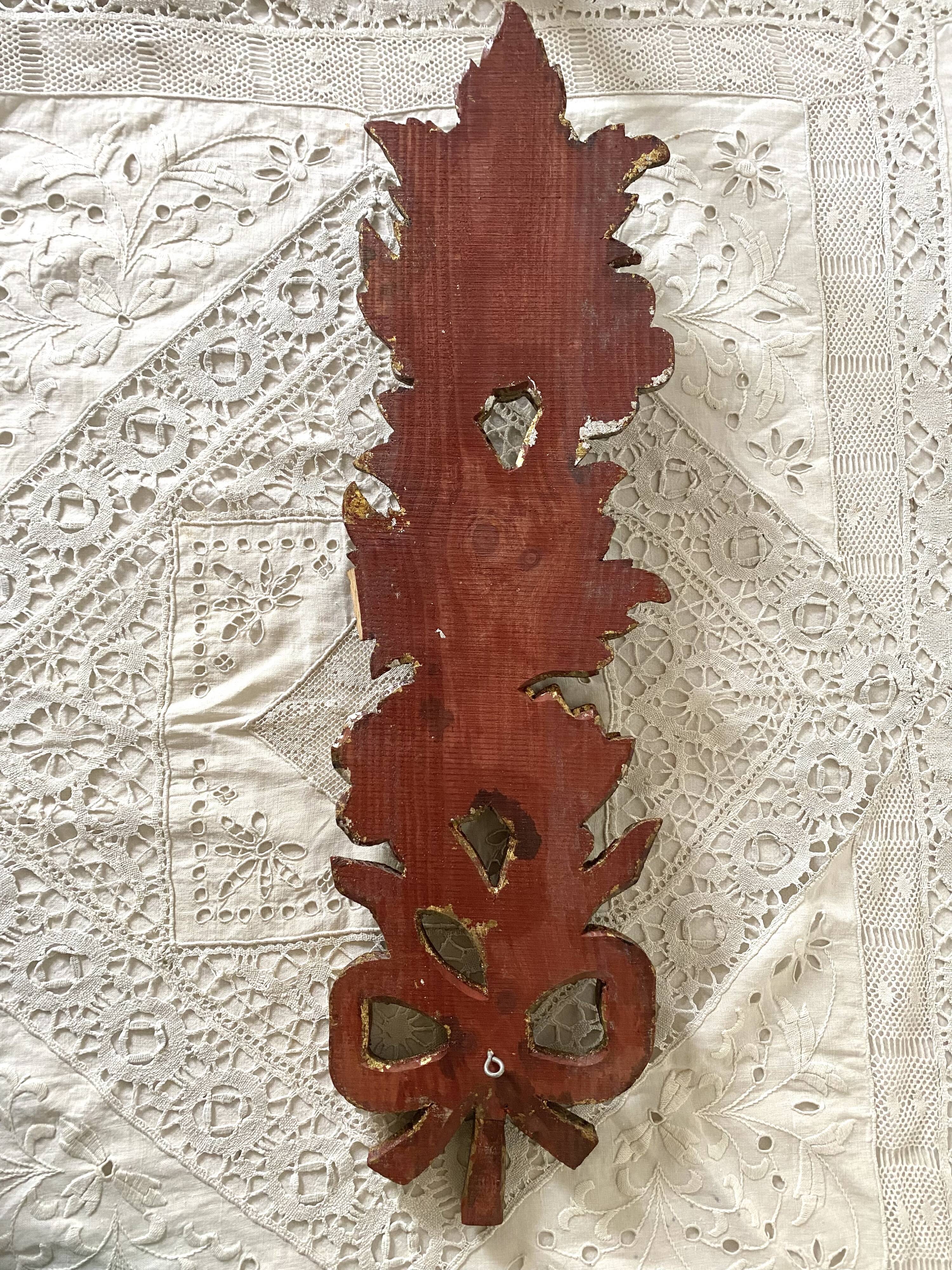 Decorative carved wooden ornament bouquet flowers and ribbon