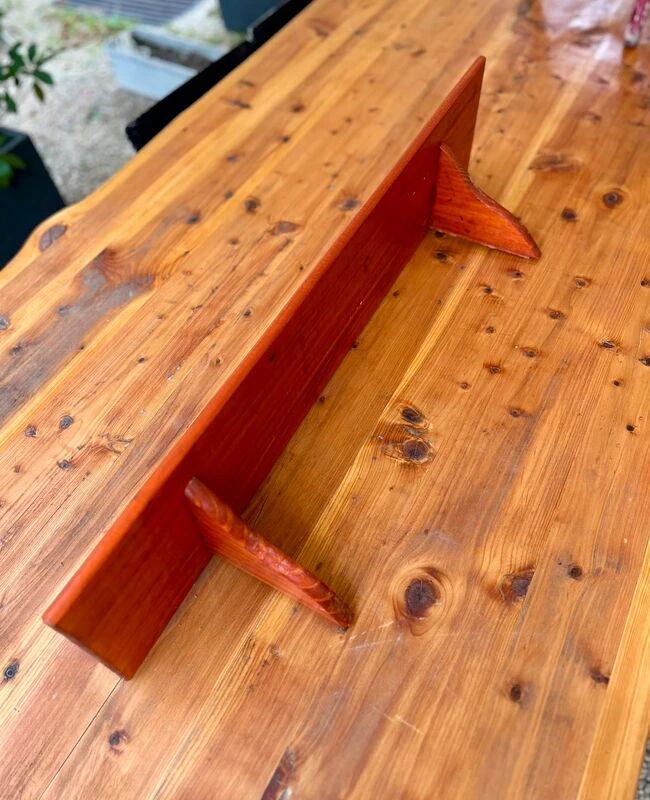 Mahogany-colored wooden shelf