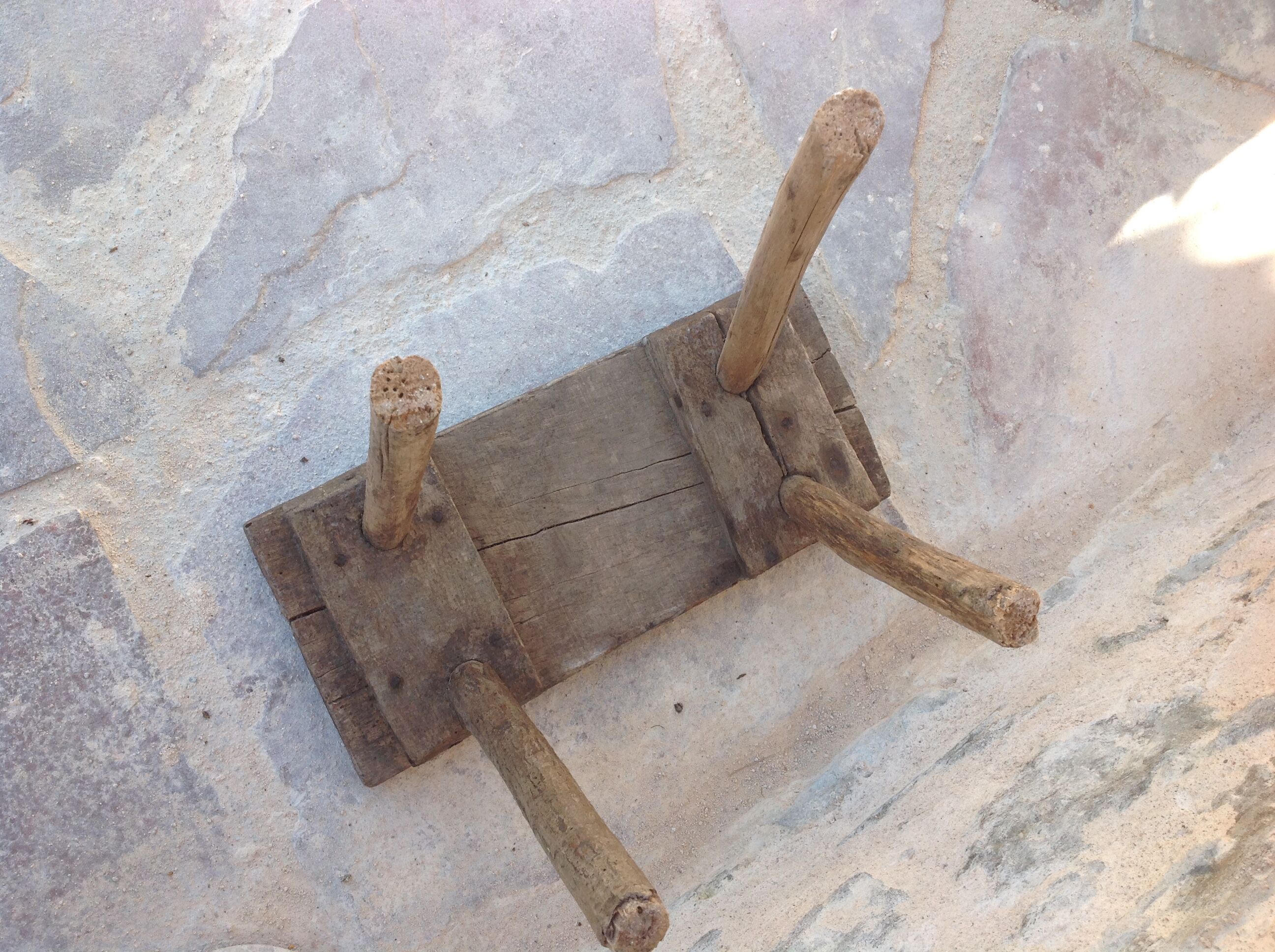 Brutalist milking stool in solid wood