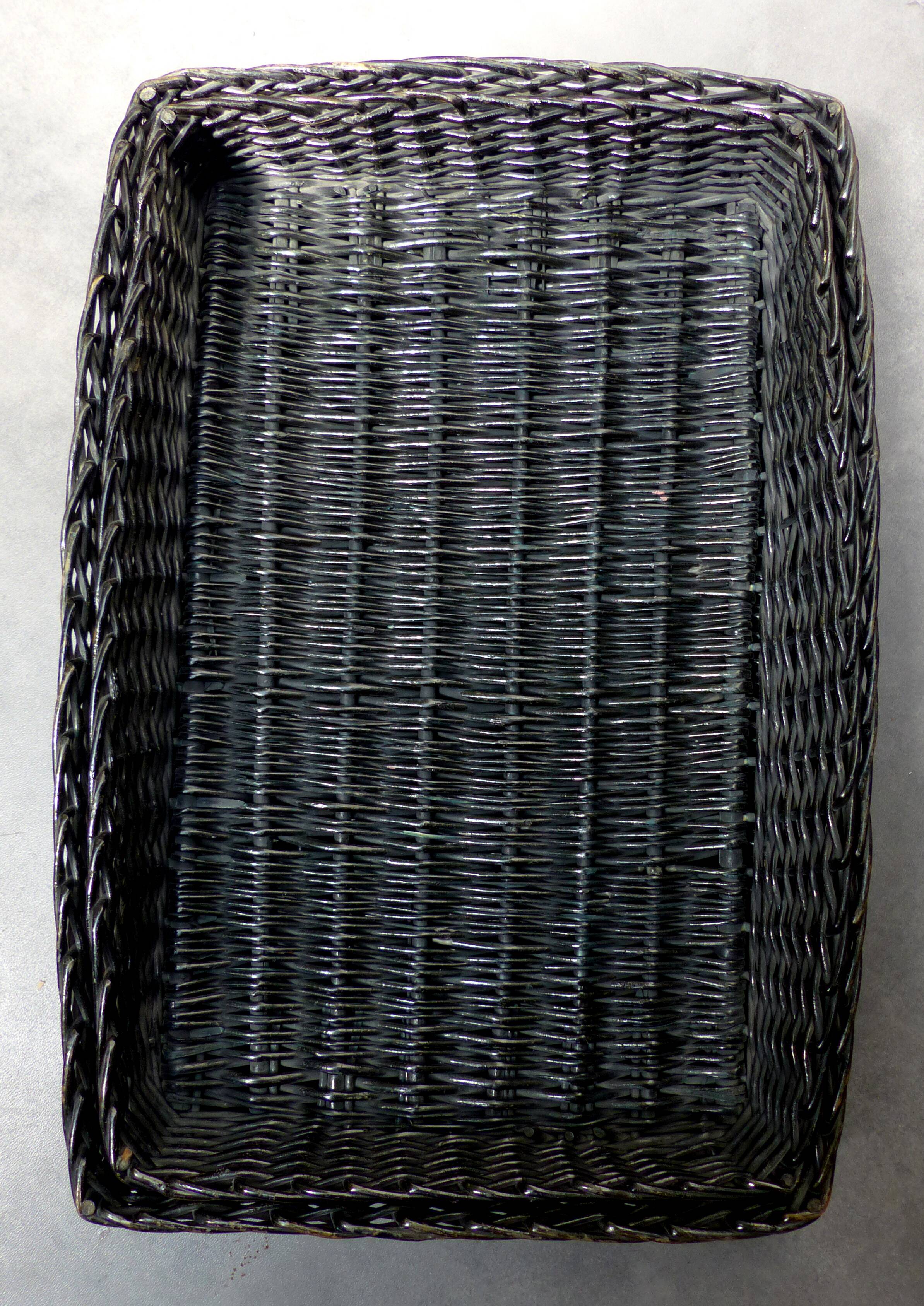 Duo of black wicker baskets