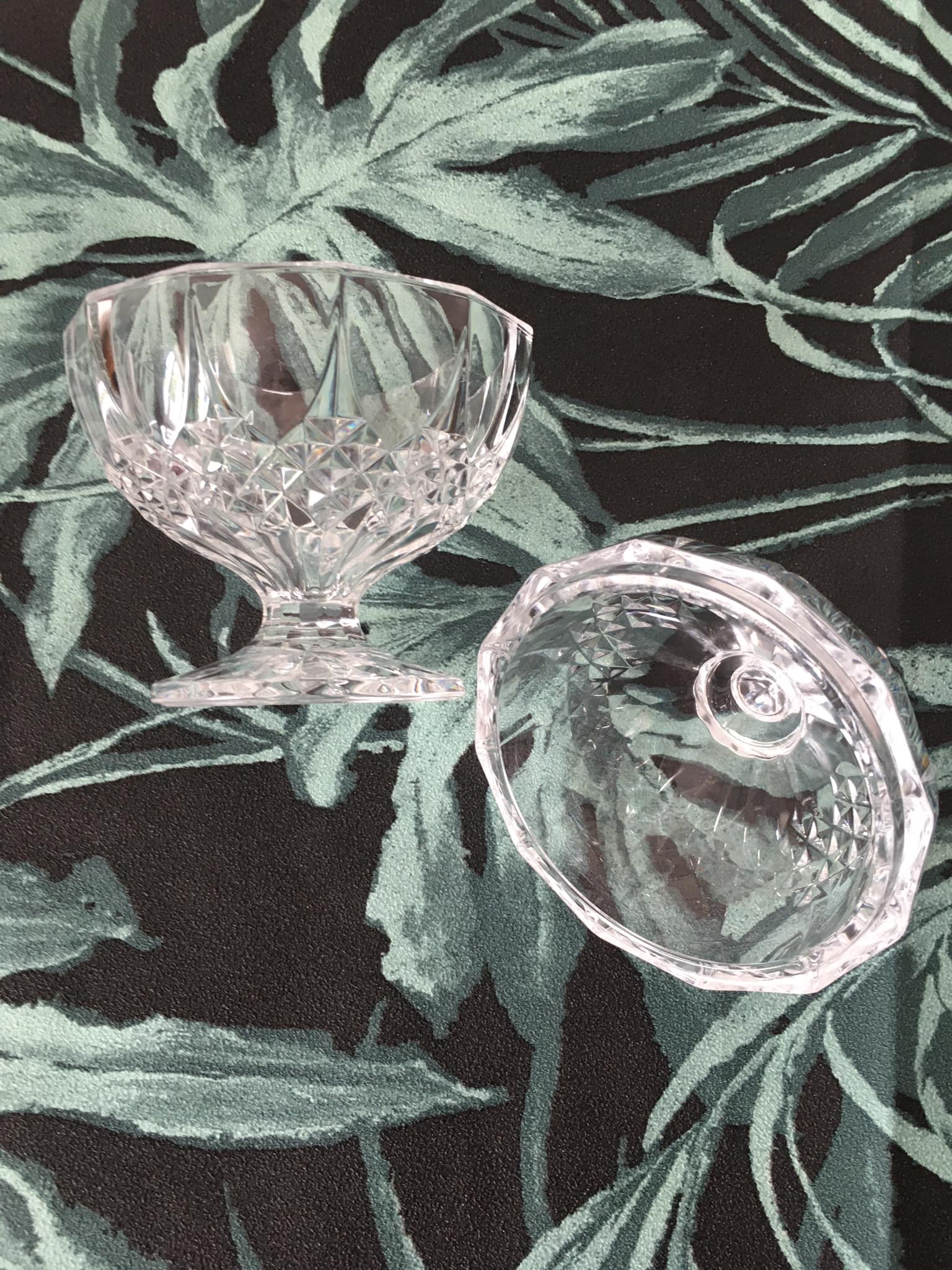 Antique sugar bowl or candy dish on a stand. Made of molded and cut crystal.