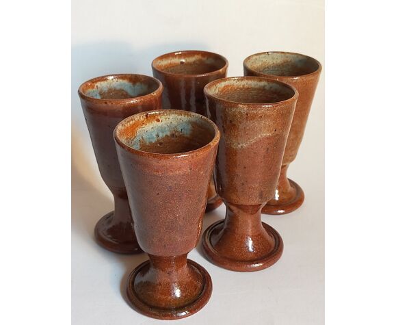 Five ancient potter's mazagrans in enamelled sandstone