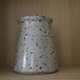 Pot with speckled sandstone lid