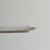 Metal butter dish and thick rectangular glass bowl.