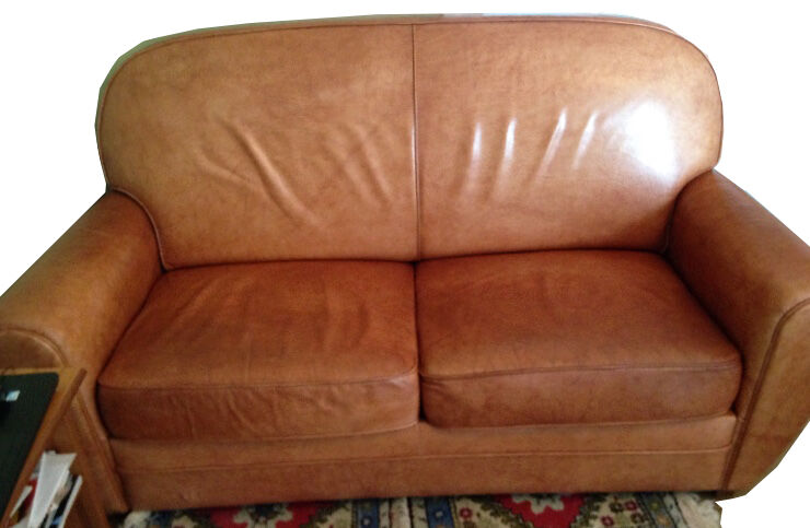 Club sofa in light brown cowhide leather