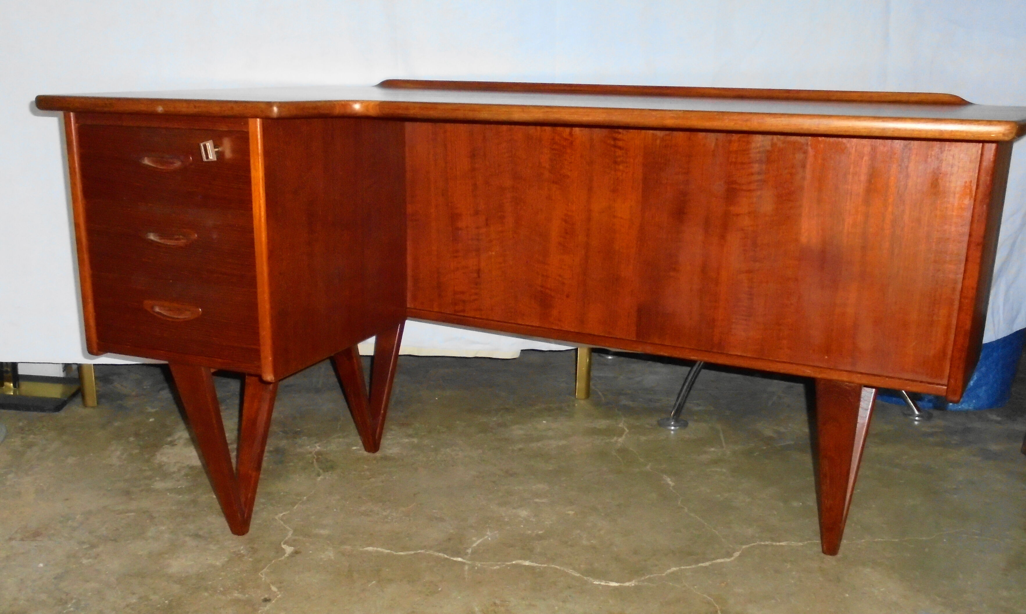 Peter Lovig Nielsen's Scandinavian teak boomerang desk from the 60s