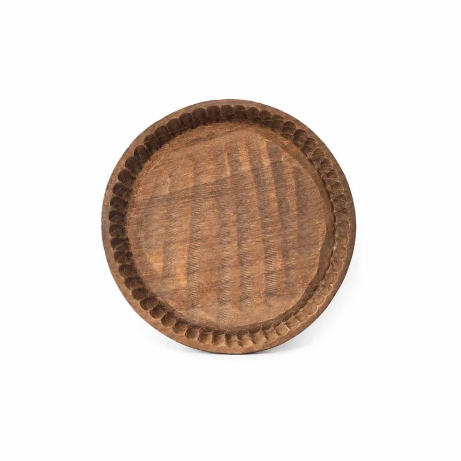 Ancient wooden plateau hand-carved