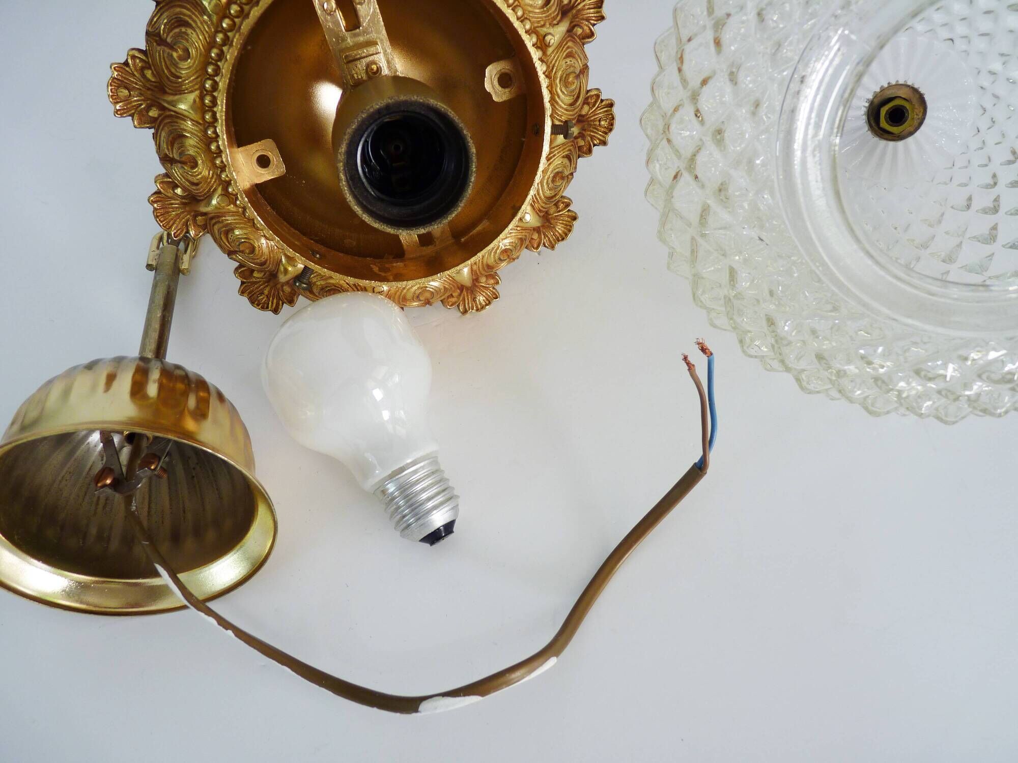 Brass and diamond-tipped chiseled glass globe hanging lamp
