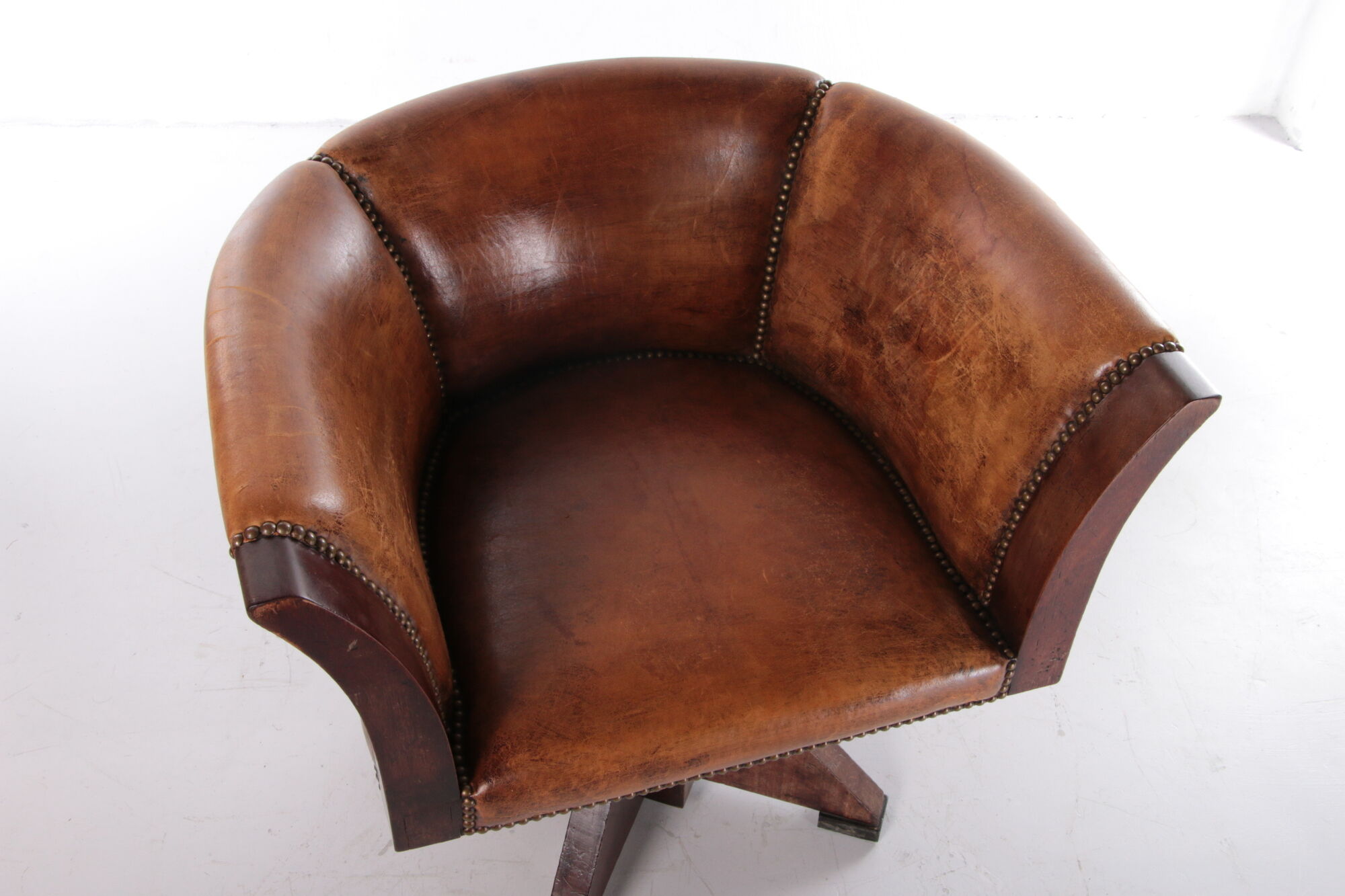 Sheepskin leather desk chair with wooden swivel base, 1970