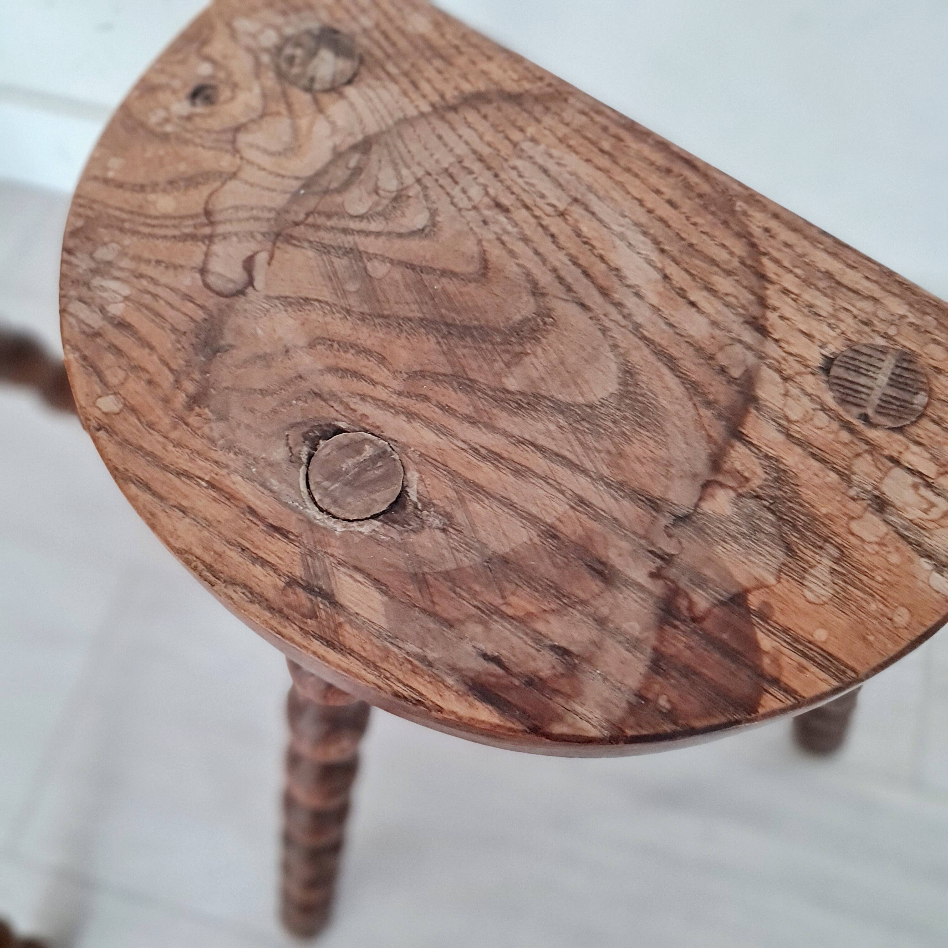 Pair of old wooden tripod stools