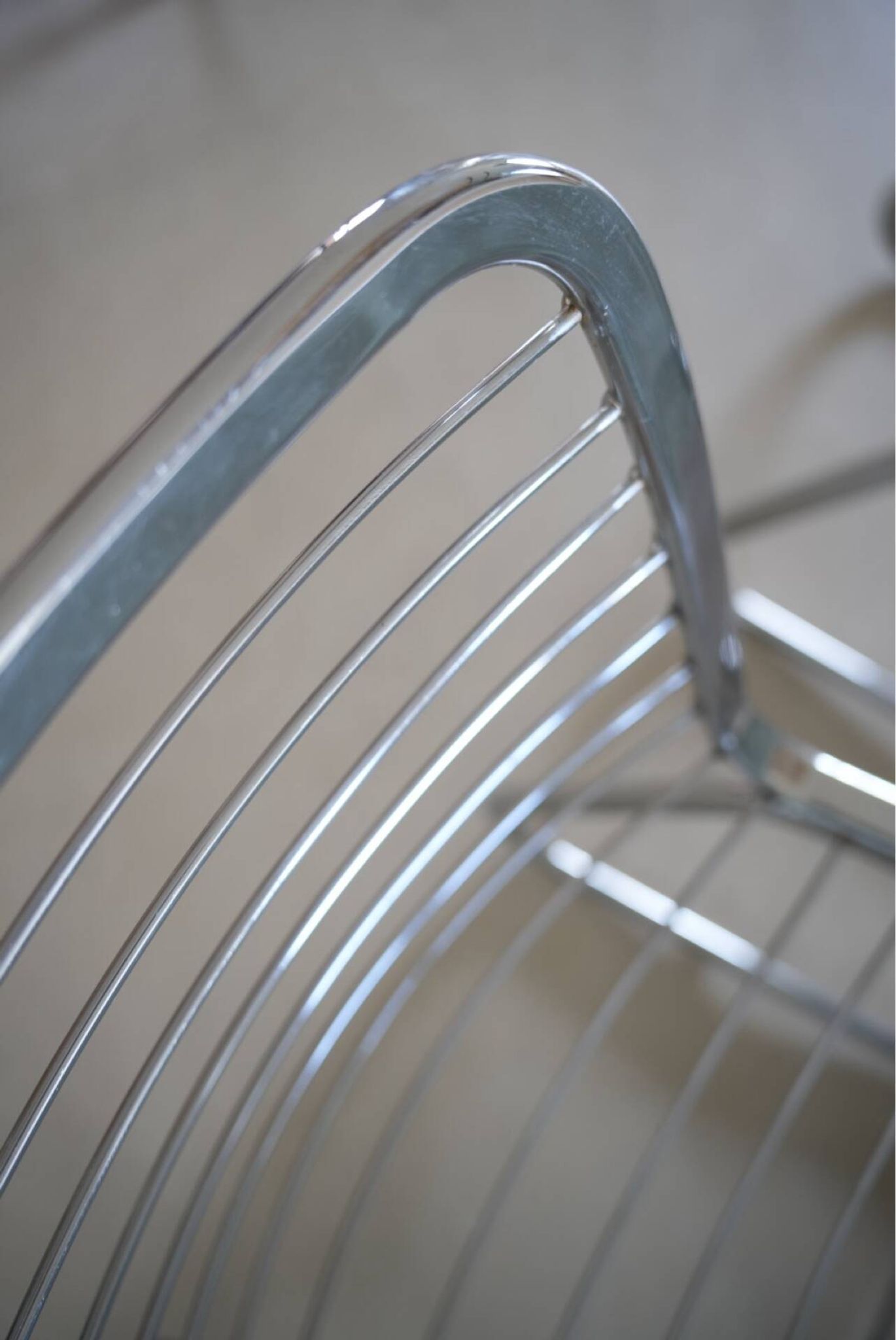 Lot of 2 chrome metal chairs by Gastone Rinaldi.