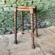 High wooden turned stool