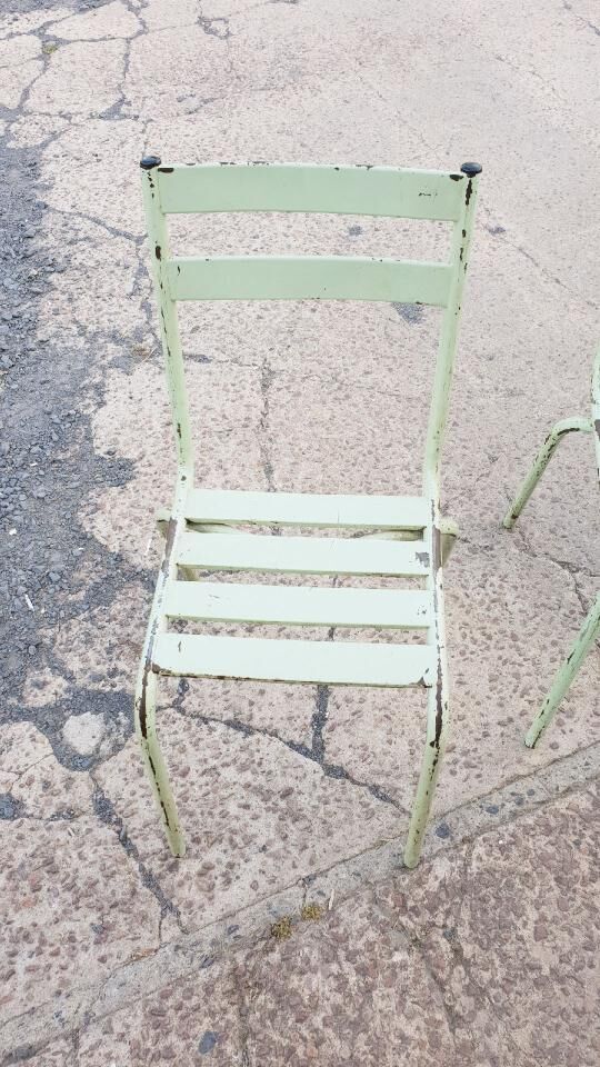 Four vintage metal chairs