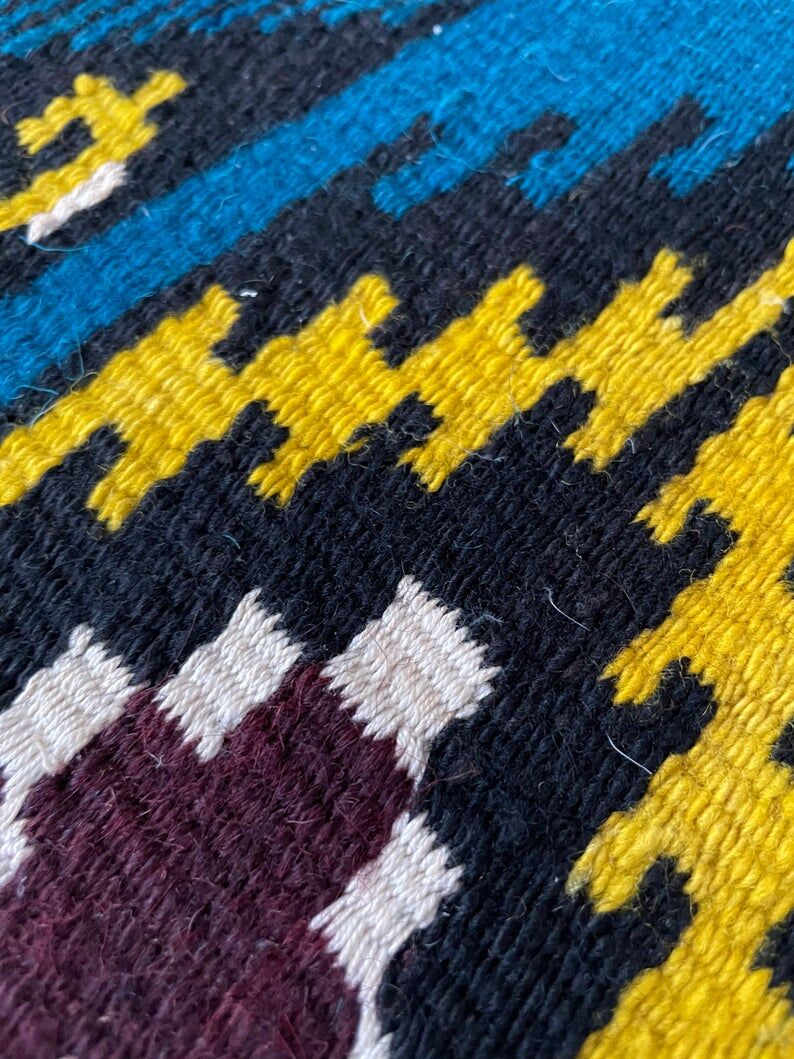 Romanian handwoven carpet with blue ground and yellow details