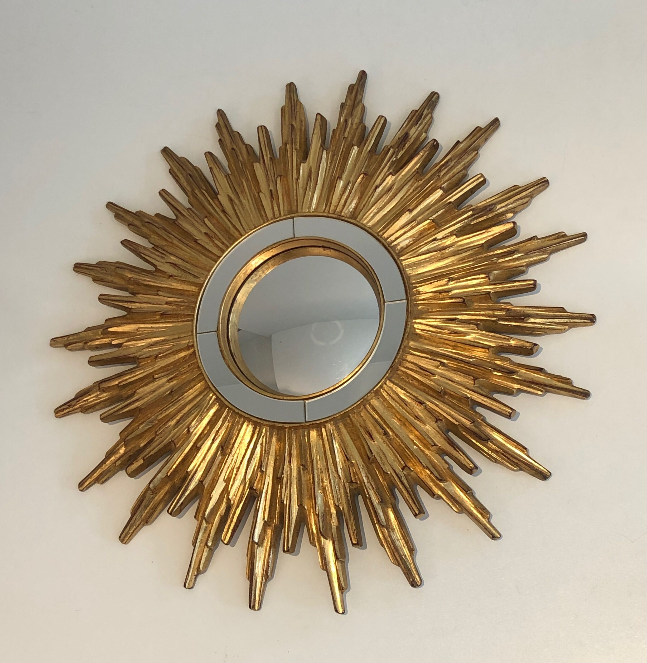 Sun mirror in golden resin 50cm
