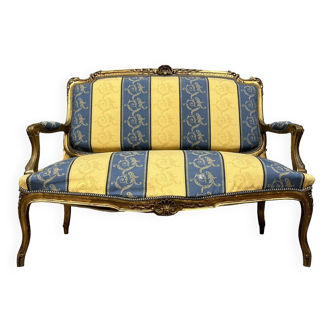 Banquette de style louis XV en bois doré époque XXeme siècle