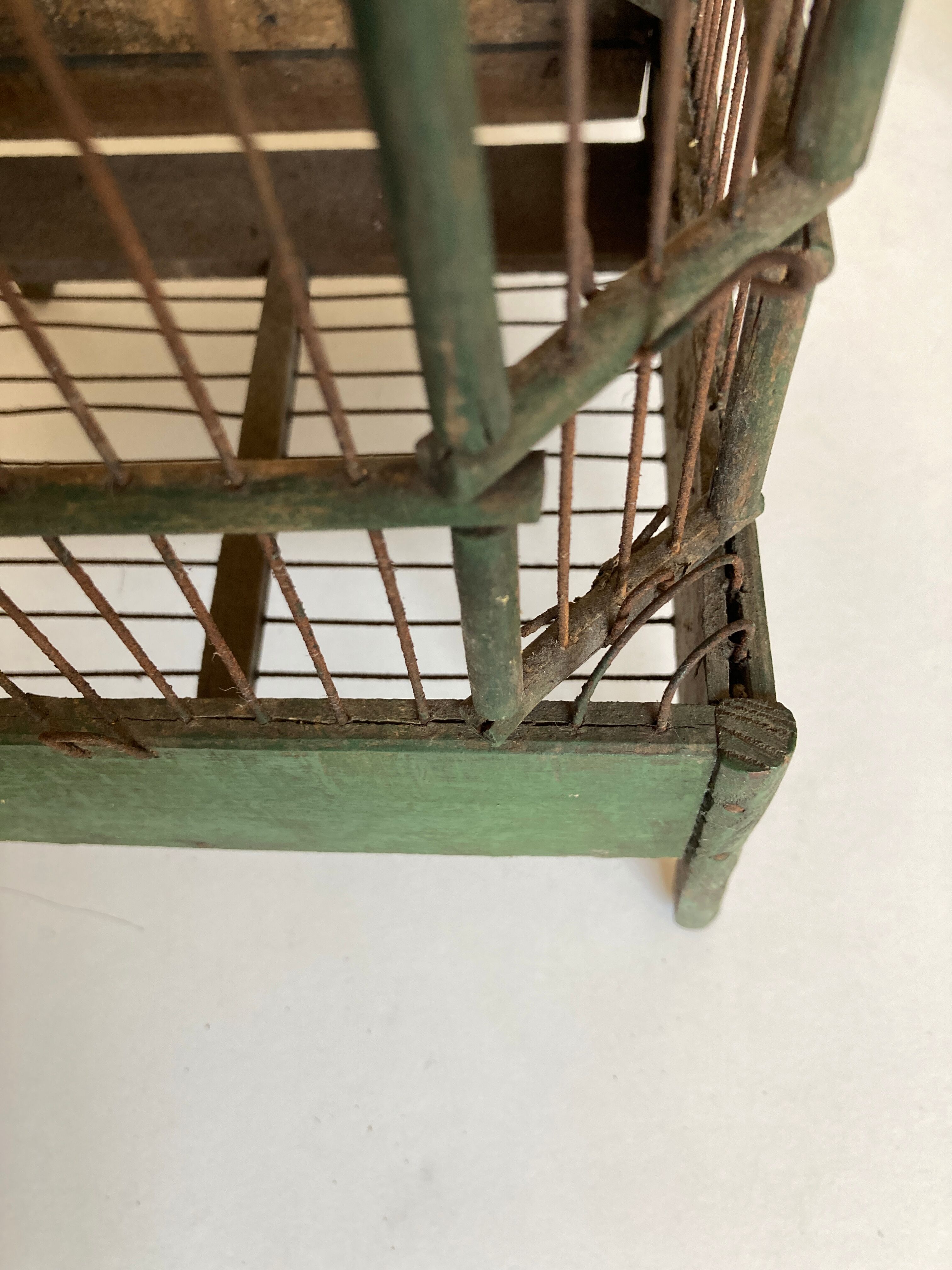 Octagonal bird cage made of wood and wire around 1920