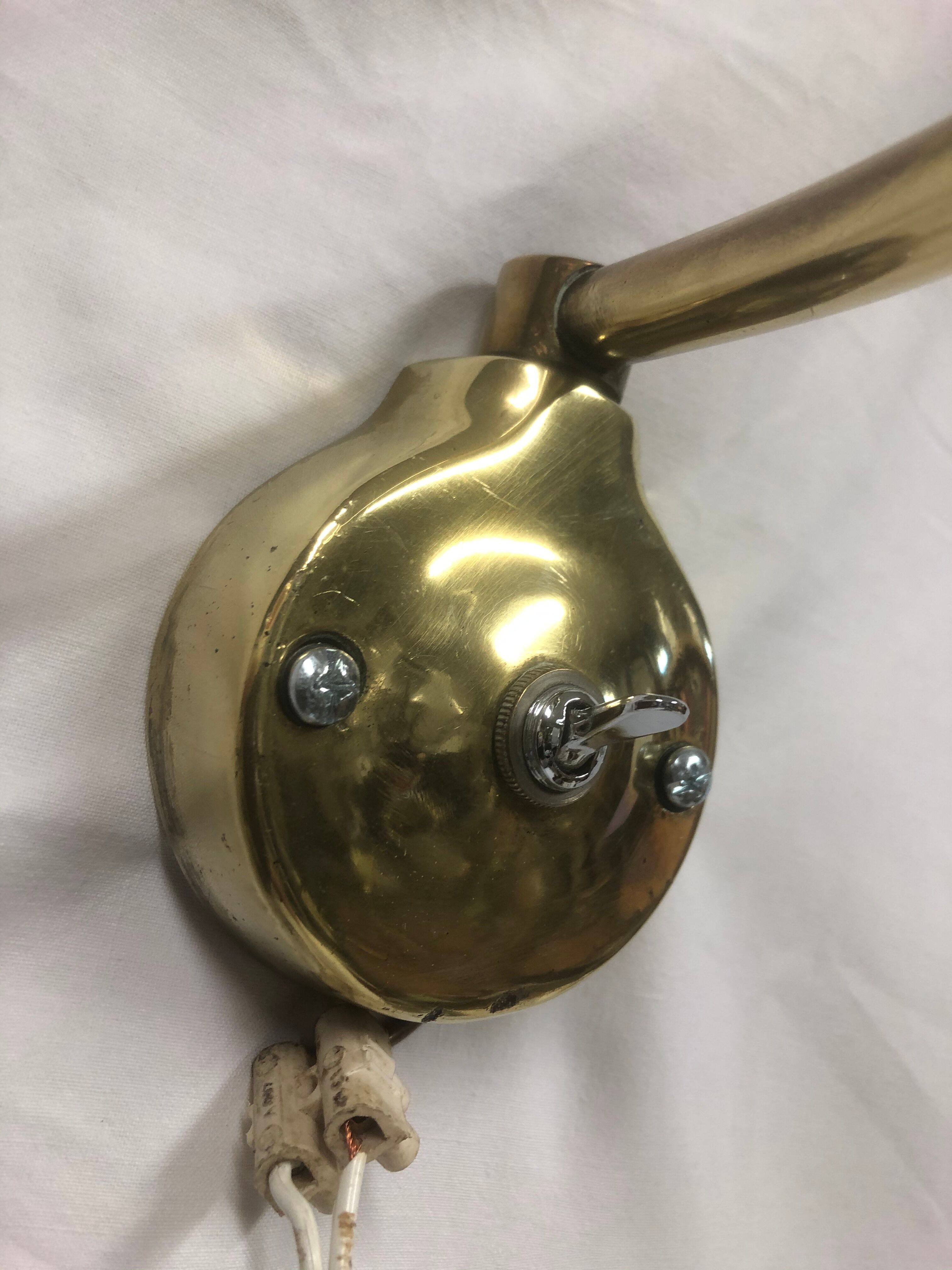 Articulated brass sconce 1950