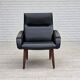 1970s, Danish armchair, black artificial leather, teak wood legs.