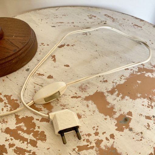 Wooden lamp and stretched wires