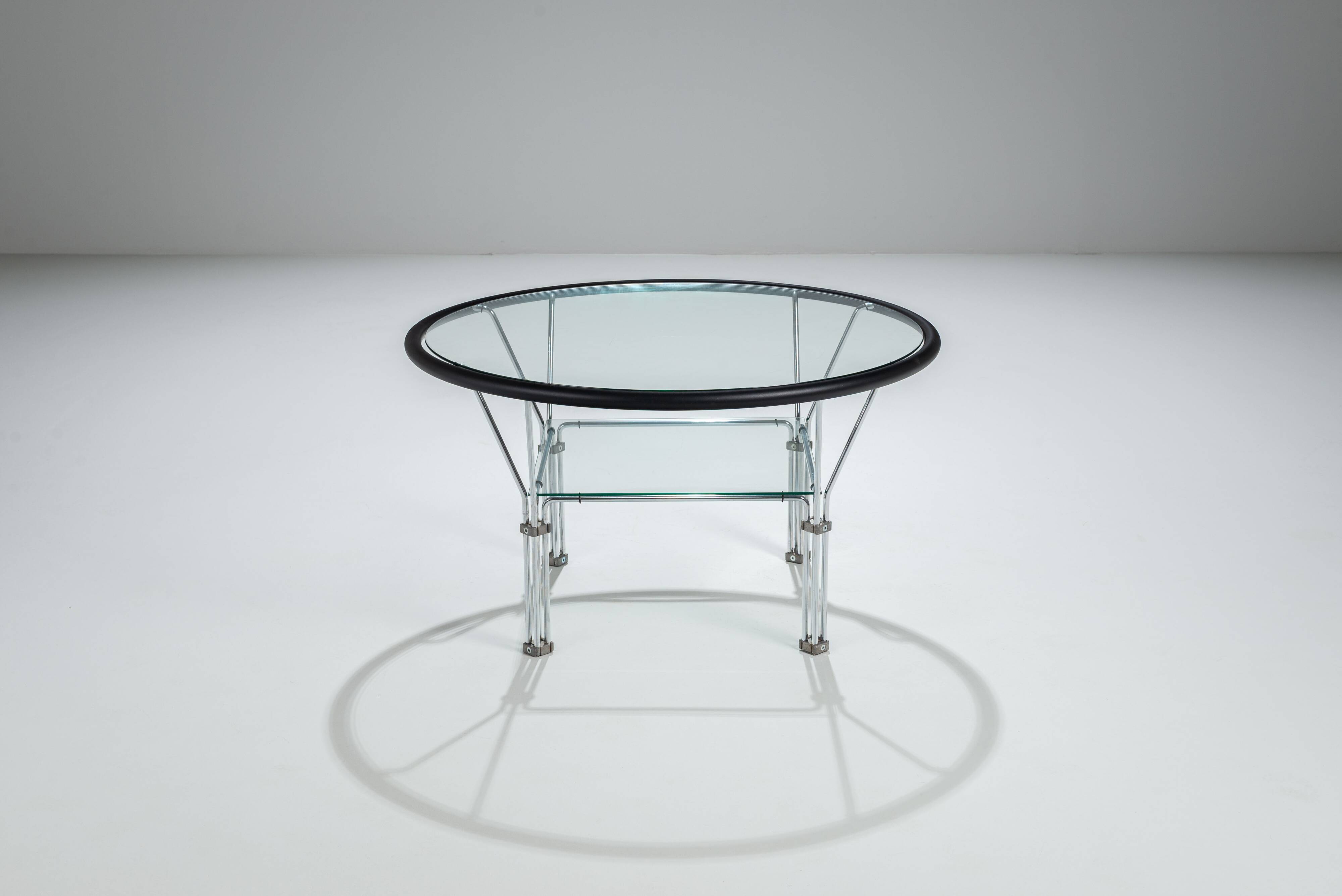 Post-Modern round glass and steel coffeetable attributed to Niels Bendtsen