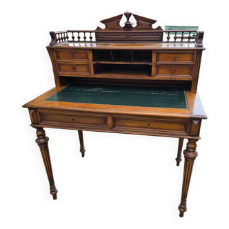 Walnut desk with drawers and sliding tops