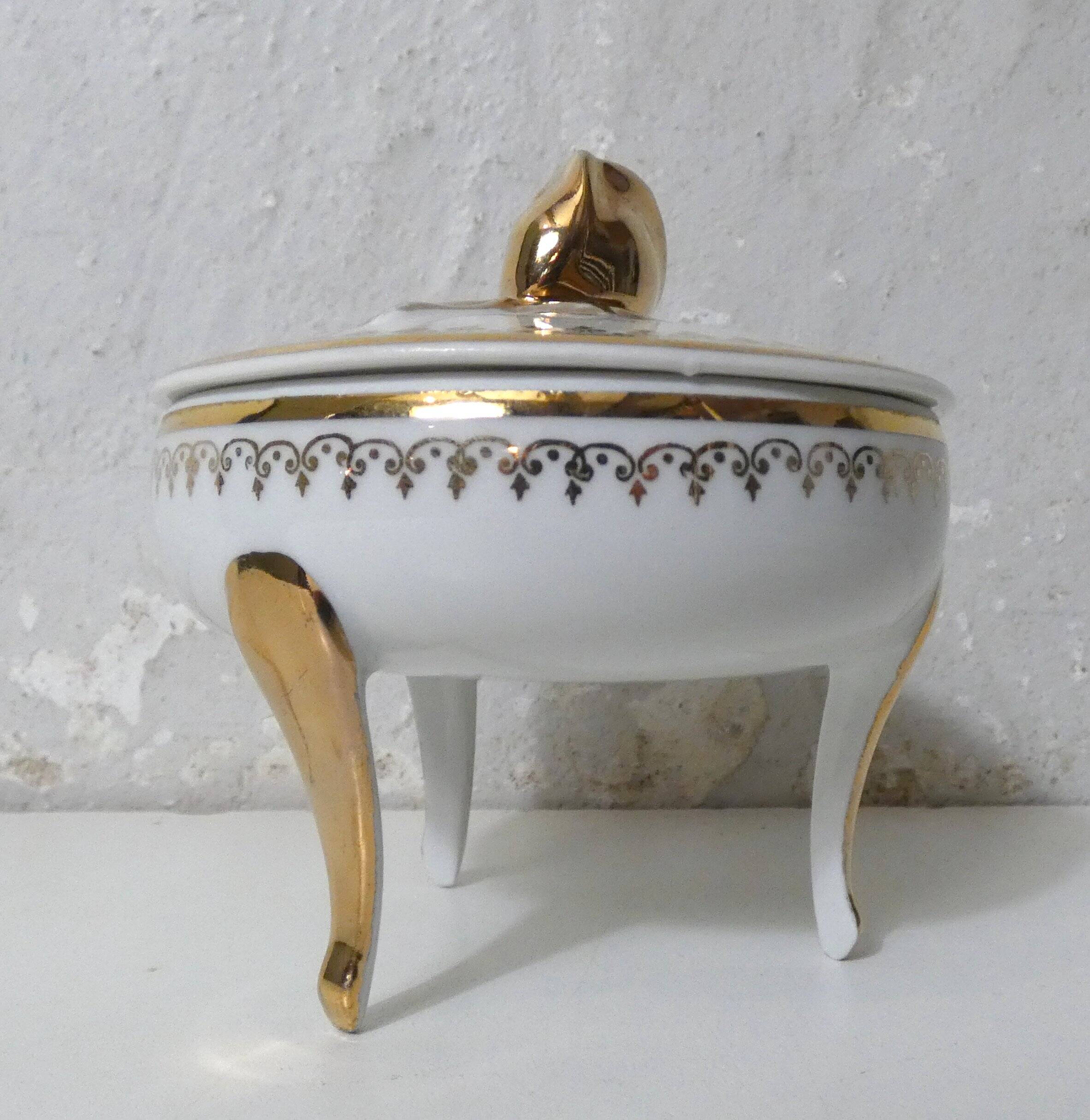 antique sweet jar in white and gold porcelain