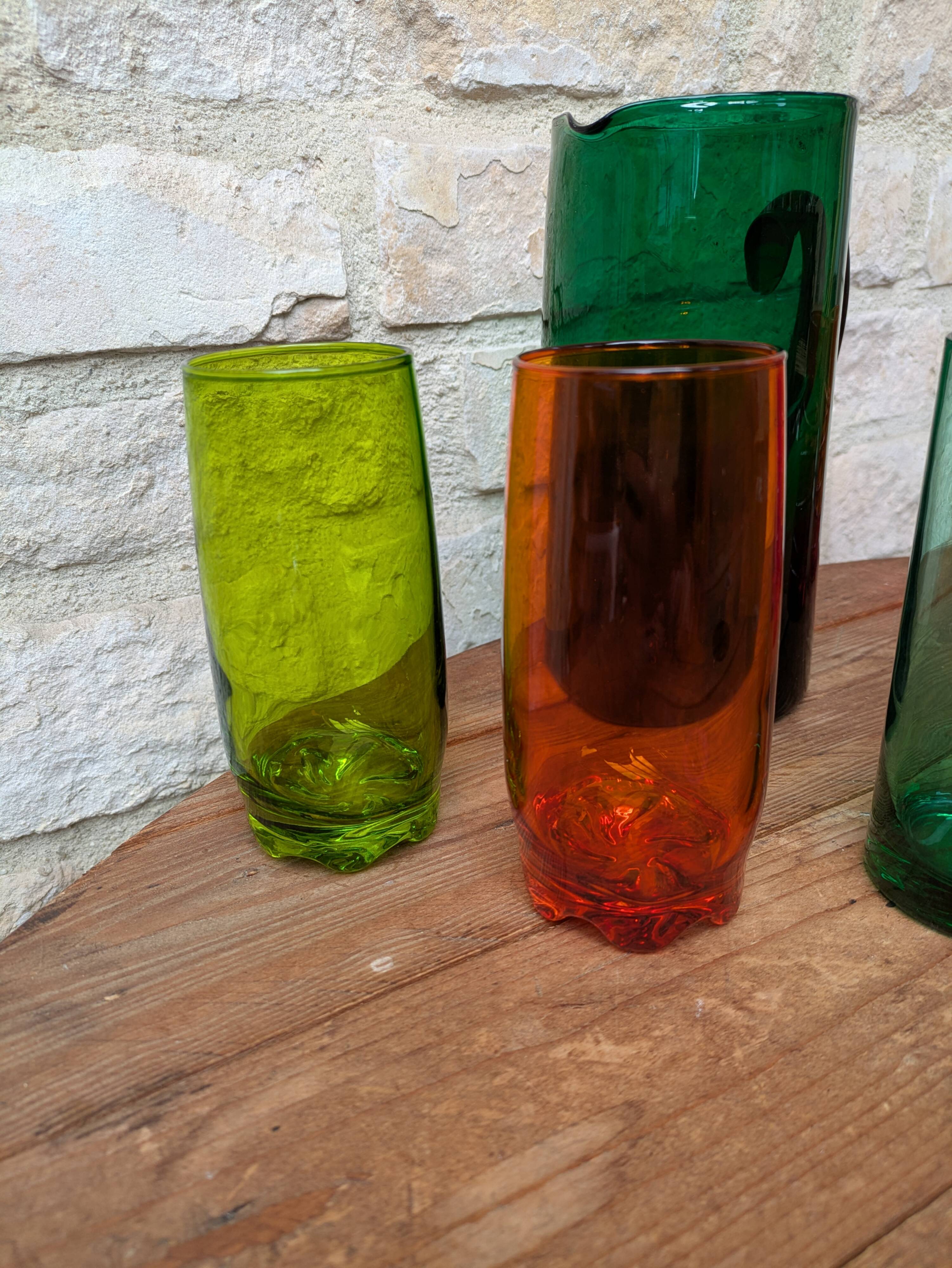 Mismatched colored glass orangeade set with pitcher and 6 glasses